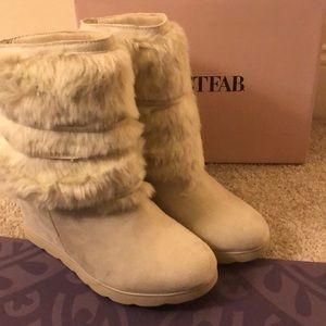 White fur boots. Never wore!